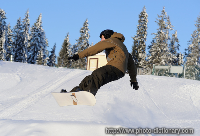 snowboarding - photo/picture definition - snowboarding word and phrase image