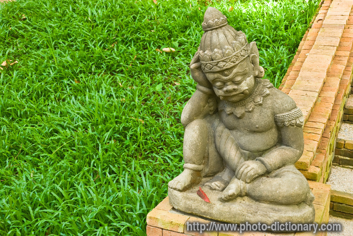 sleepy child statue - photo/picture definition - sleepy child statue word and phrase image