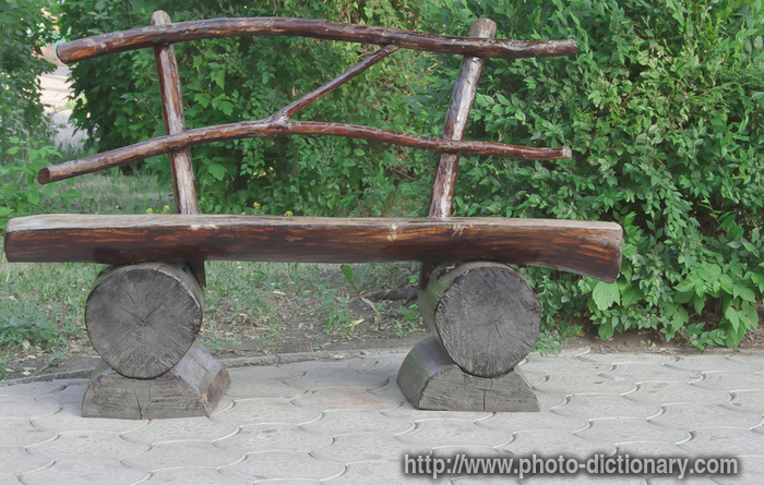 carved bench - photo/picture definition - carved bench word and phrase image