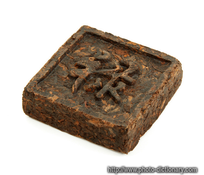 black tea briquette - photo/picture definition - black tea briquette word and phrase image