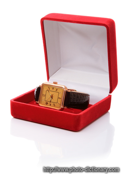 gold wrist watch - photo/picture definition - gold wrist watch word and phrase image