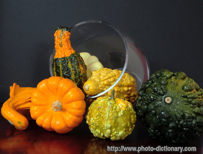 Halloween stripe pumpkin - photo/picture definition - Halloween stripe pumpkin word and phrase image
