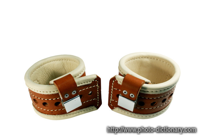 leather wrist restraints - photo/picture definition - leather wrist restraints word and phrase image