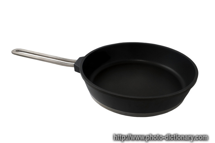 metal frying pan - photo/picture definition - metal frying pan word and phrase image
