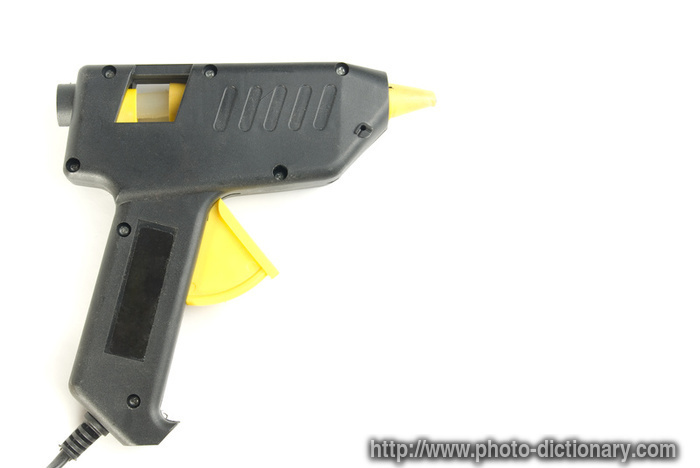 glue pistol - photo/picture definition - glue pistol word and phrase image