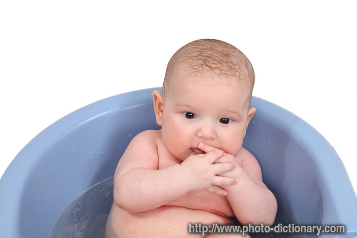 baby in bathtub - photo/picture definition - baby in bathtub word and phrase image