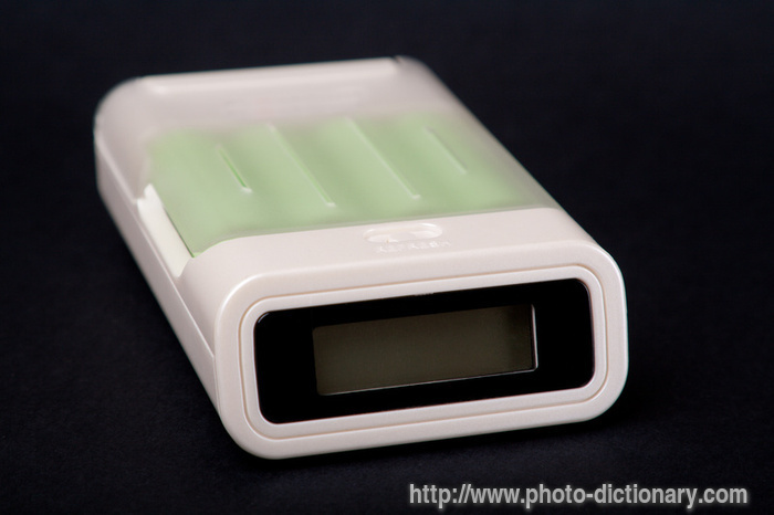 battery charger - photo/picture definition - battery charger word and phrase image
