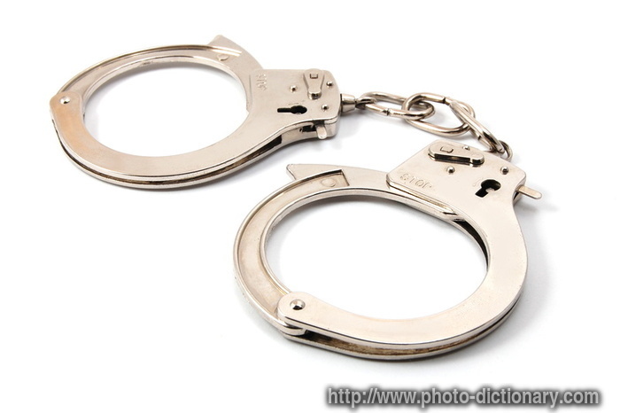 handcuffs - photo/picture definition - handcuffs word and phrase image
