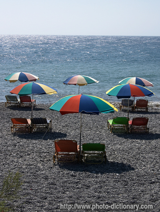 beach umbrellas - photo/picture definition - beach umbrellas word and phrase image