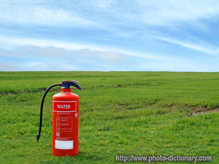 fire extinguisher - photo/picture definition - fire extinguisher word and phrase image