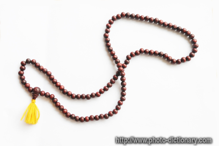 praying beads - photo/picture definition - praying beads word and phrase image