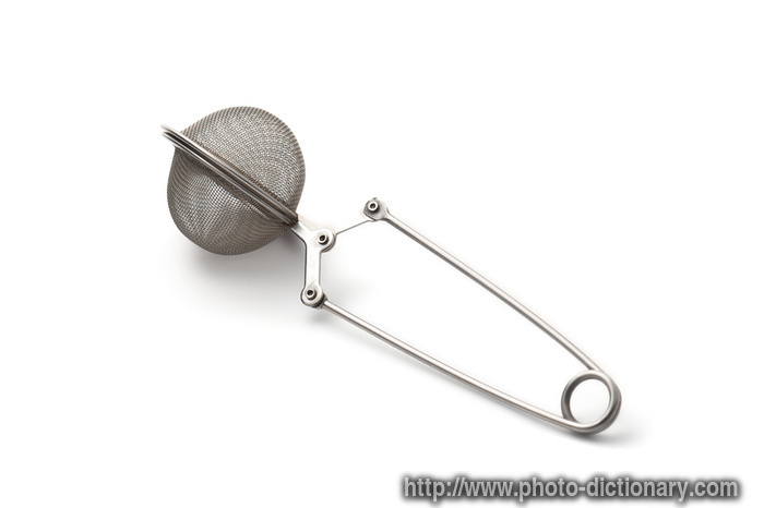 tea strainer - photo/picture definition - tea strainer word and phrase image