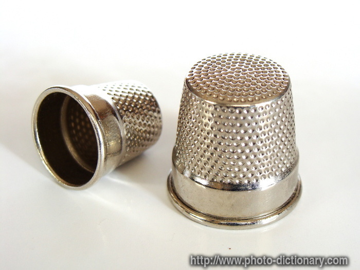 thimble - photo/picture definition - thimble word and phrase image