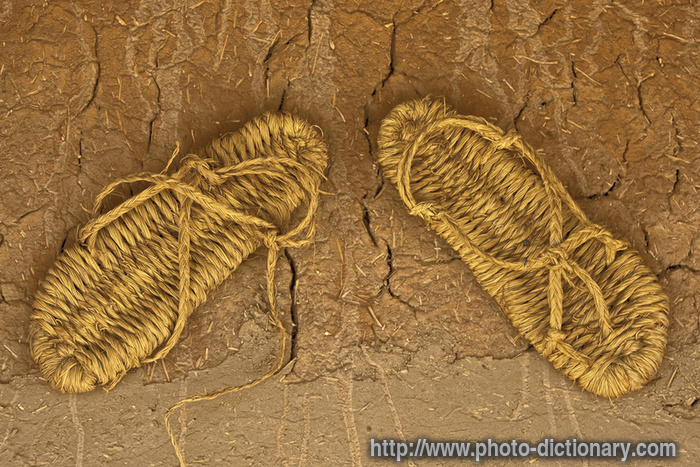 straw sandals - photo/picture definition - straw sandals word and phrase image