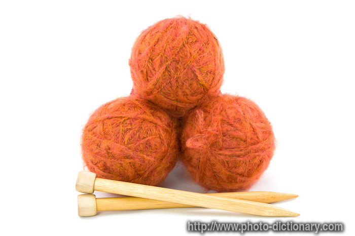 orange yarn - photo/picture definition - orange yarn word and phrase image