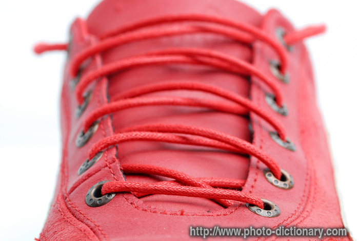 shoe lacing - photo/picture definition - shoe lacing word and phrase image