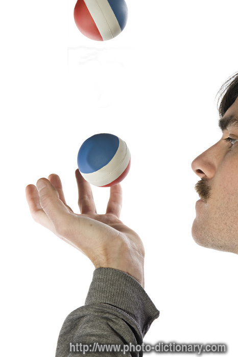 juggling - photo/picture definition - juggling word and phrase image