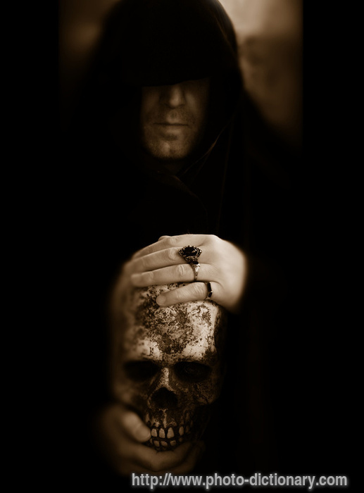 hooded man - photo/picture definition - hooded man word and phrase image