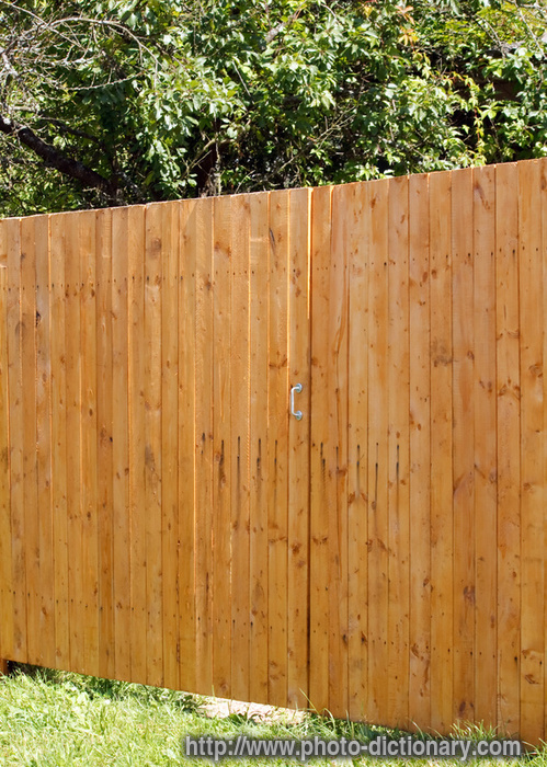 wooden fence - photo/picture definition - wooden fence word and phrase image