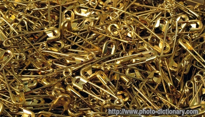 safety pins - photo/picture definition - safety pins word and phrase image