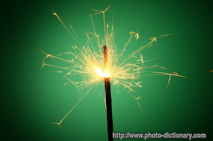 Christmas sparkler - photo/picture definition - Christmas sparkler word and phrase image