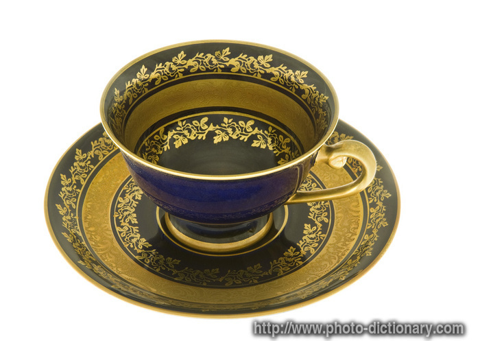 cobalt and gold cup - photo/picture definition - cobalt and gold cup word and phrase image