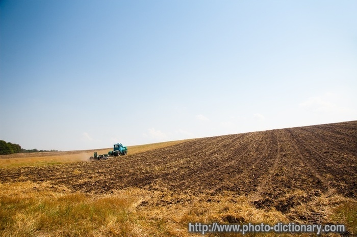 ploughing - photo/picture definition - ploughing word and phrase image
