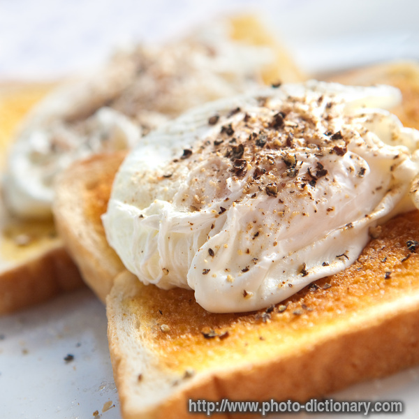 poached egg on toast - photo/picture definition - poached egg on toast word and phrase image
