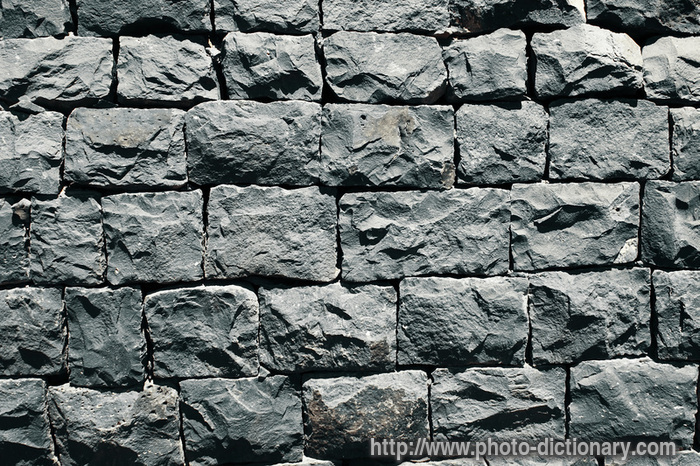 gray basalt stone - photo/picture definition - gray basalt stone word and phrase image