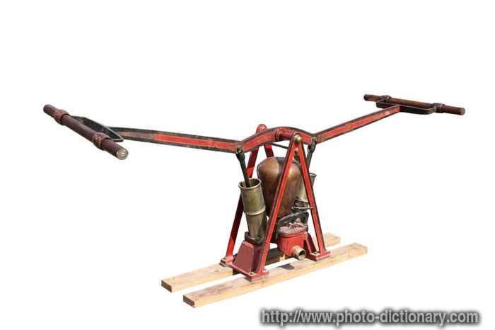 ancient fire pump - photo/picture definition - ancient fire pump word and phrase image