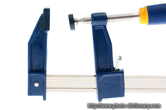 fastening clamp - photo/picture definition - fastening clamp word and phrase image