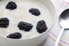 oatmeal with blackberries - photo/picture definition - oatmeal with blackberries word and phrase image