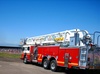 ladder fire truck - photo/picture definition - ladder fire truck word and phrase image