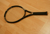 tennis racket - photo/picture definition - tennis racket word and phrase image