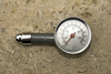 tire gauge - photo/picture definition - tire gauge word and phrase image
