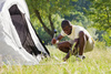 fastening tent - photo/picture definition - fastening tent word and phrase image