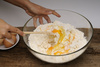 mixing ingredients - photo/picture definition - mixing ingredients word and phrase image