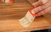 varnishing a table - photo/picture definition - varnishing a table word and phrase image