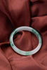 jade bracelet - photo/picture definition - jade bracelet word and phrase image