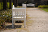 white bench - photo/picture definition - white bench word and phrase image