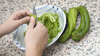 chopping peppers - photo/picture definition - chopping peppers word and phrase image