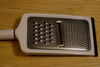 cheese grater - photo/picture definition - cheese grater word and phrase image