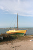 stranded boat - photo/picture definition - stranded boat word and phrase image