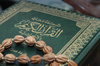 Koran - photo/picture definition - Koran word and phrase image